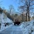 PROVINCIA GRANDA - Le operazioni di sgombero neve sulla strada (Foto Boschiazzo)